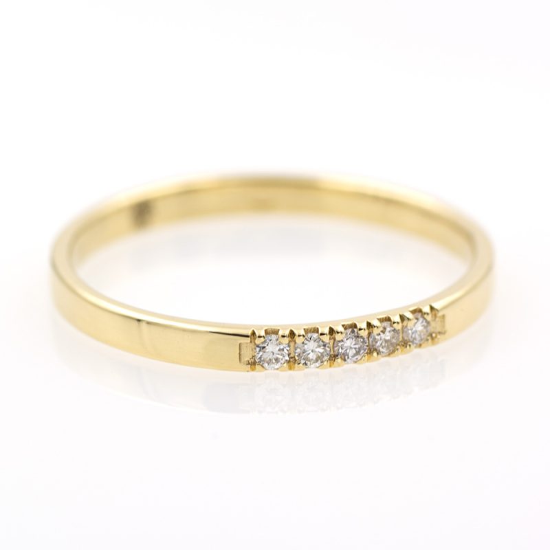 Anillo cinquillo de oro amarillo 18k/750 con 0,06 ct. de diamantes.-Adamas Ibérica.