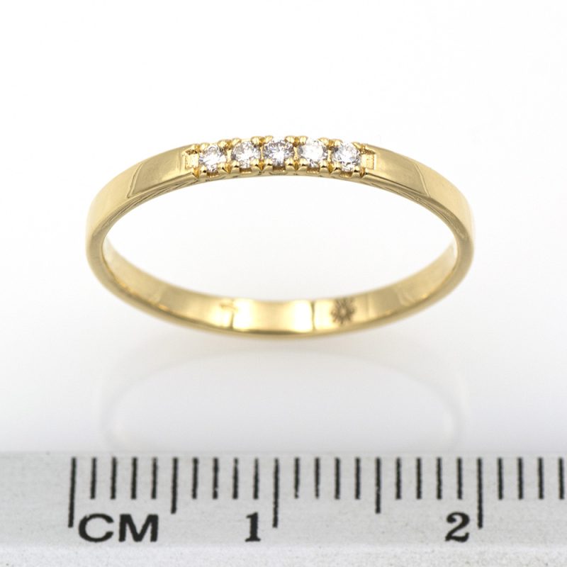 Anillo cinquillo de oro amarillo 18k/750 con 0,06 ct. de diamantes.-Adamas Ibérica.