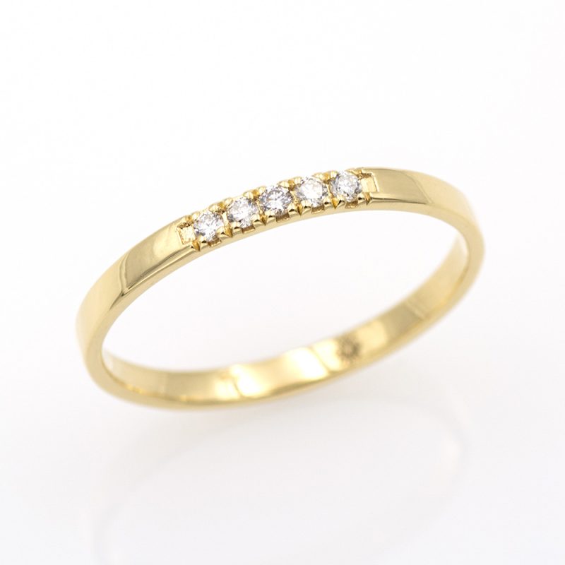 Anillo cinquillo de oro amarillo 18k/750 con 0,06 ct. de diamantes.-Adamas Ibérica.