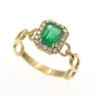 Anillo tipo cadena con esmeralda y diamantes.